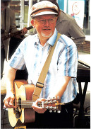 Driftwood guitarist